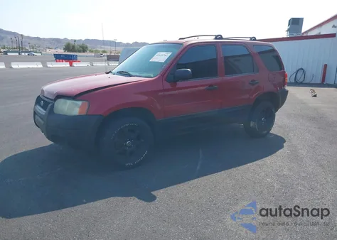 2003 Ford Escape Xls z USA, uszkodzony, nr VIN 1FMYU02193KB33177